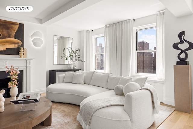 60 Gramercy Park N Unit 16A, New York City, NY 10010 - unfurnished room featuring beam ceiling, light wood finished floors, and baseboards