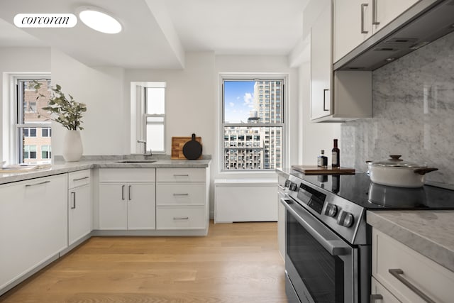 60 Gramercy Park N Unit 16A, New York City, NY 10010 - full bath with toilet, a stall shower, vanity, and tile walls