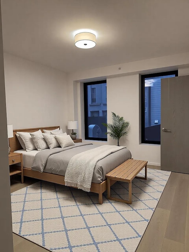 bedroom with light wood-style floors