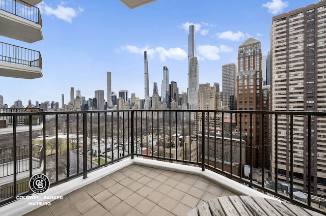 balcony featuring a city view