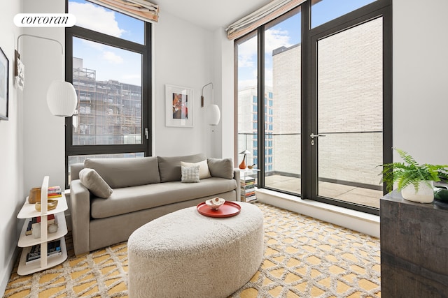 living area featuring a view of city