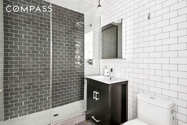 172 Wilson Ave Pha, Pha, New York City, NY 11237 - bathroom featuring tile walls, a shower stall, vanity, and toilet