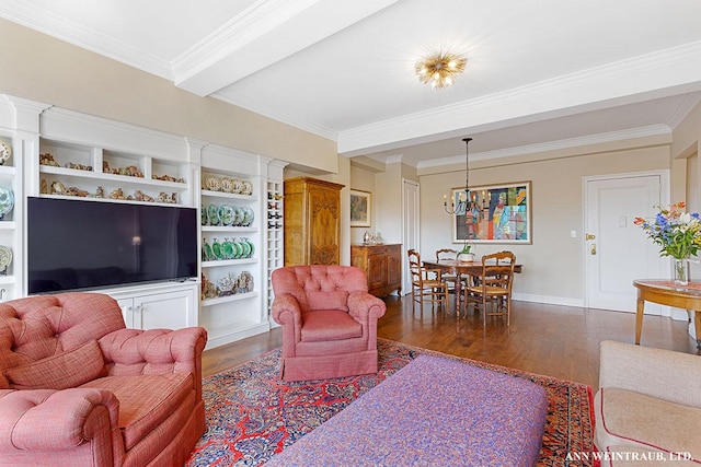 living area featuring beam ceiling, ornamental molding, wood finished floors, an inviting chandelier, and baseboards