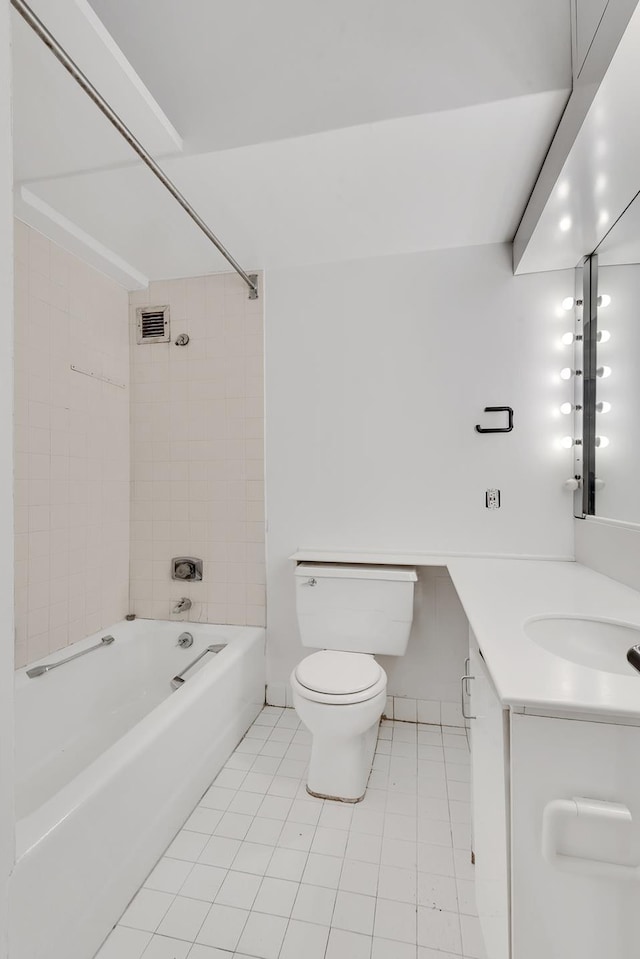 full bath with tile patterned floors, visible vents, toilet, bathing tub / shower combination, and vanity