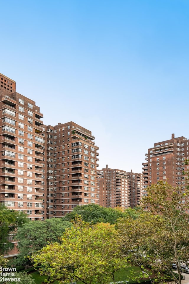 view of property with a city view