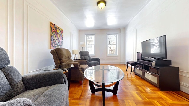 living room featuring a decorative wall