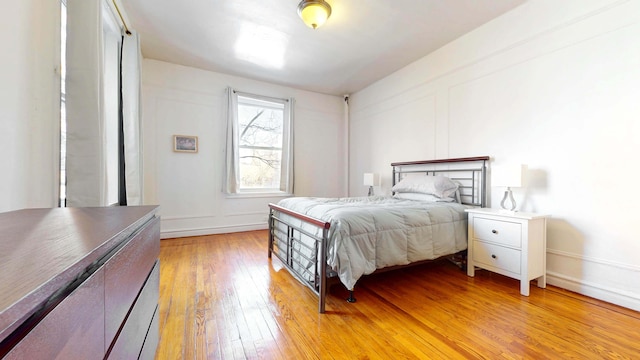 bedroom featuring light wood-type flooring