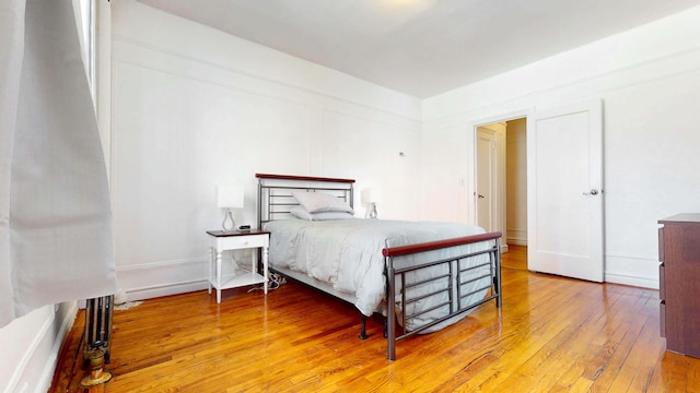 bedroom featuring hardwood / wood-style floors