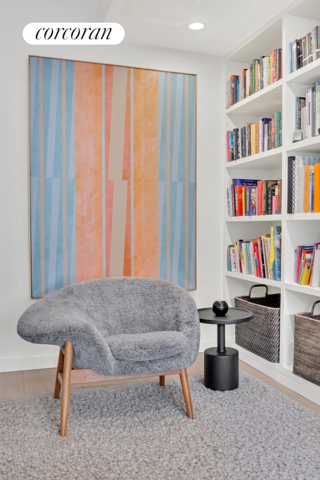 living area with carpet flooring
