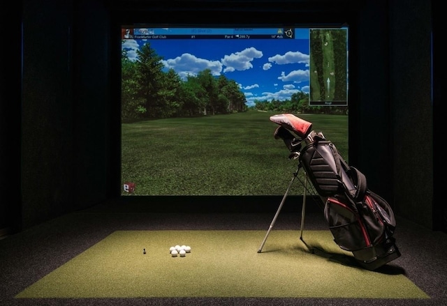 50 W St Unit Ph58B, New York City, NY 10006 - playroom featuring golf simulator
