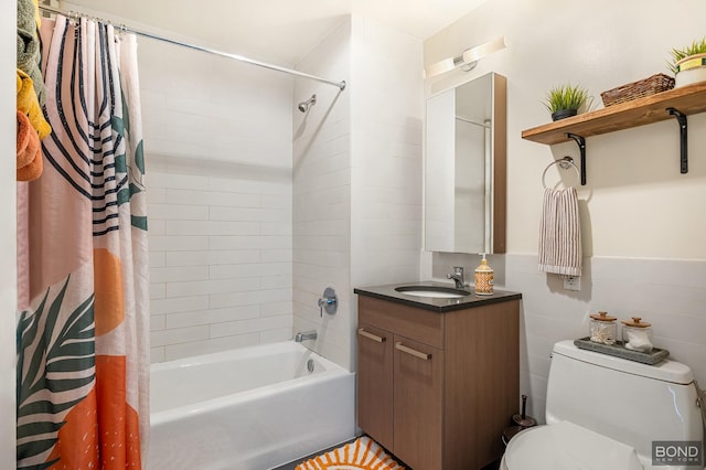bathroom featuring toilet, shower / bath combination with curtain, and vanity