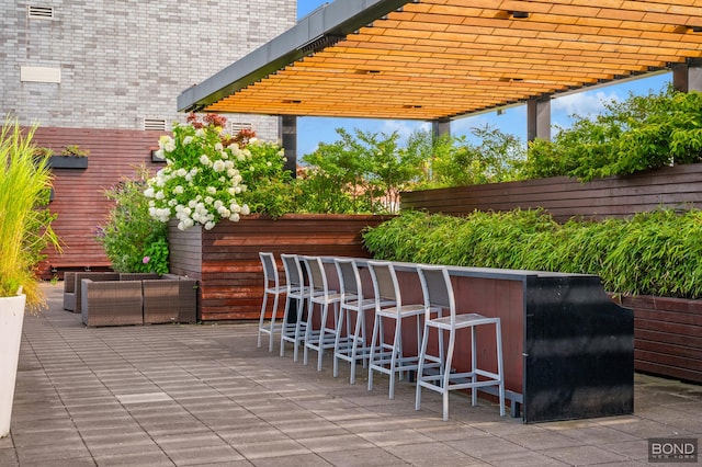 view of patio featuring a pergola