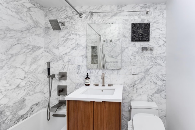 345 W 58th St Unit 6Ss, New York City, NY 10019 - bathroom featuring vanity, tub / shower combination, toilet, and tile walls