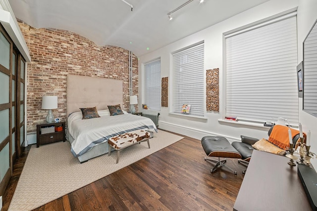 11 W 20th St Unit 4-Flr, New York City, NY 10011 - bedroom with wood finished floors and brick wall
