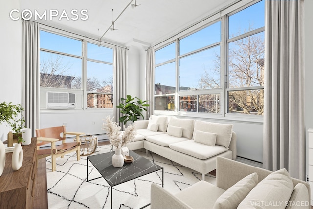 sunroom / solarium featuring cooling unit