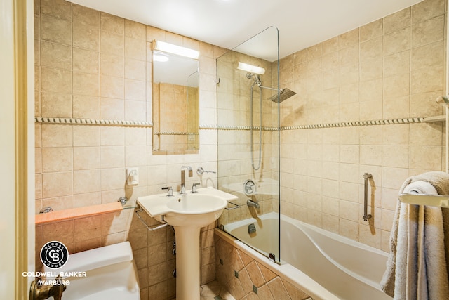 50 Sutton Pl S Unit 14G, New York City, NY 10022 - full bathroom featuring tile walls and tiled shower / bath