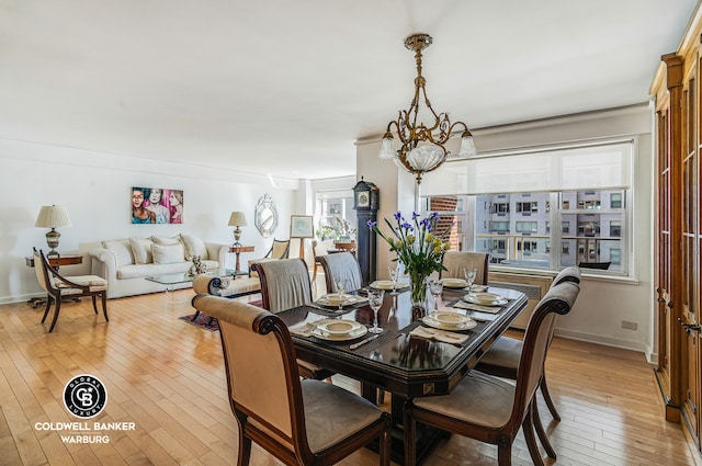 50 Sutton Pl S Unit 14G, New York City, NY 10022 - dining area with light wood-style floors and baseboards