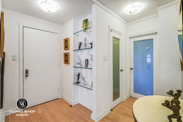 50 Sutton Pl S Unit 14G, New York City, NY 10022 - foyer featuring light wood-style floors