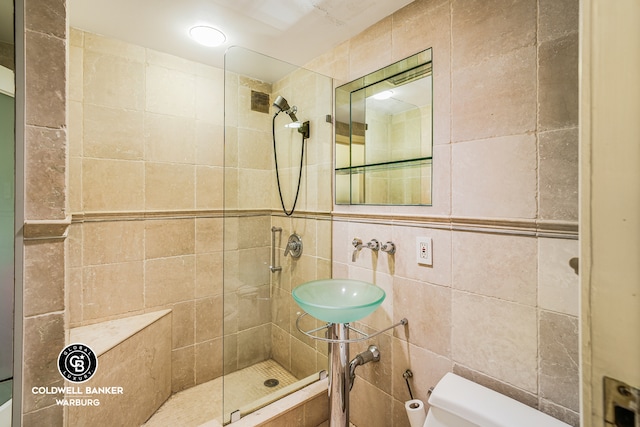 50 Sutton Pl S Unit 14G, New York City, NY 10022 - bathroom with tile walls and tiled shower