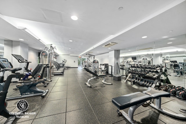 workout area featuring visible vents and recessed lighting