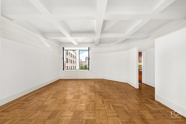 unfurnished room featuring beamed ceiling, coffered ceiling, and baseboards