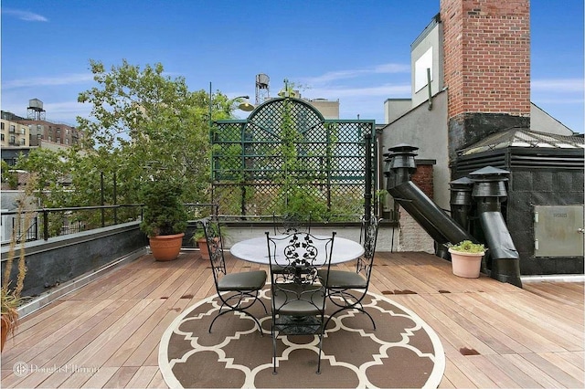 deck featuring outdoor dining area