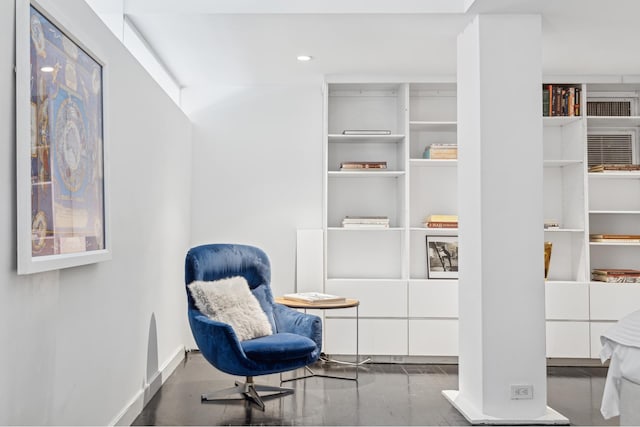 sitting room featuring baseboards