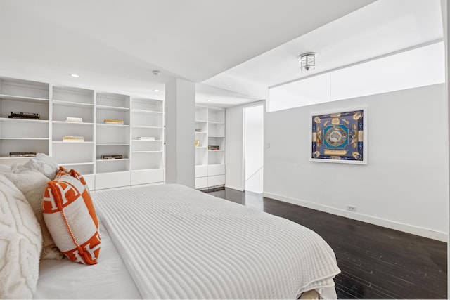 bedroom featuring dark wood finished floors, recessed lighting, and baseboards