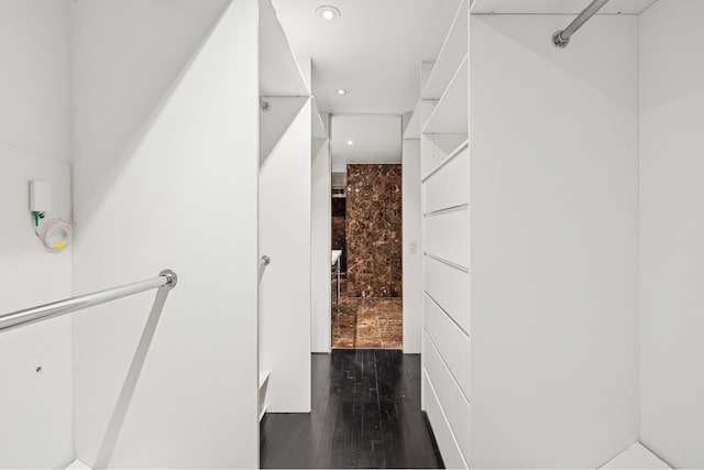 bathroom featuring recessed lighting and wood finished floors