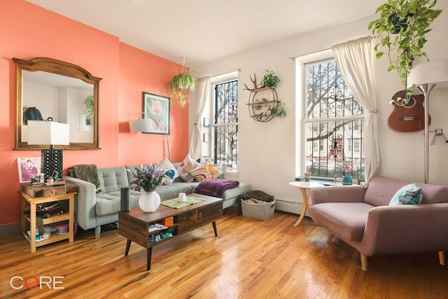 living room featuring hardwood / wood-style floors and baseboard heating