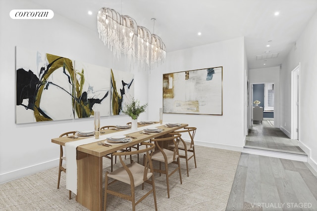 dining space with visible vents, recessed lighting, baseboards, and wood finished floors