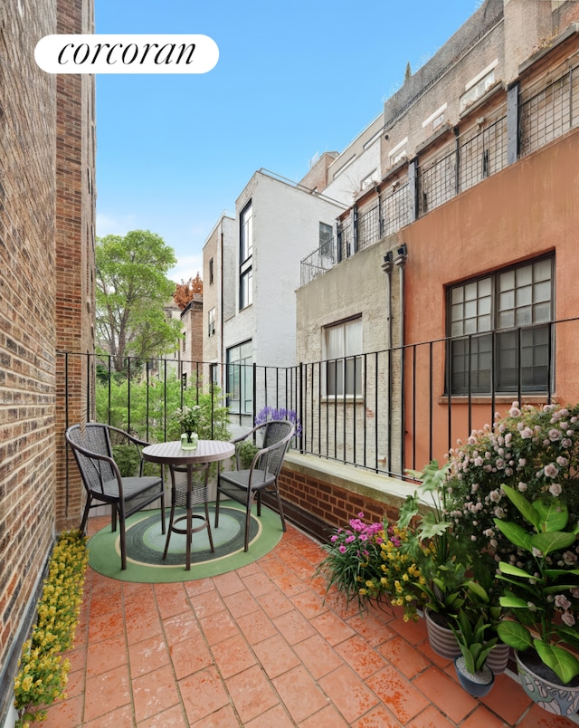 view of patio featuring fence