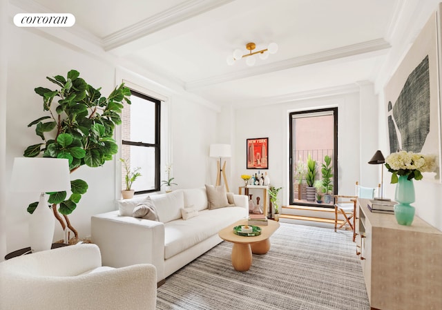 living room featuring beamed ceiling, wood finished floors, visible vents, and ornamental molding