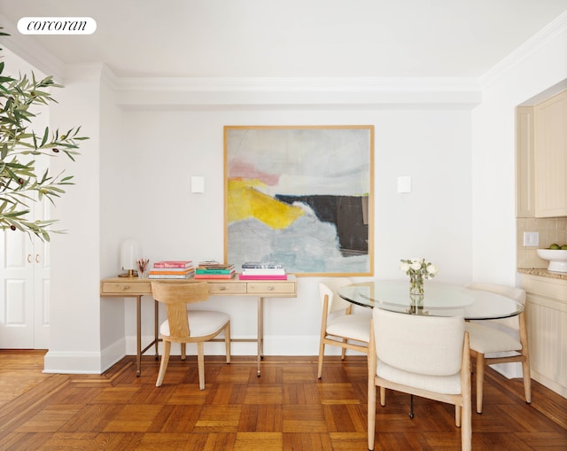 dining area featuring crown molding, visible vents, and baseboards