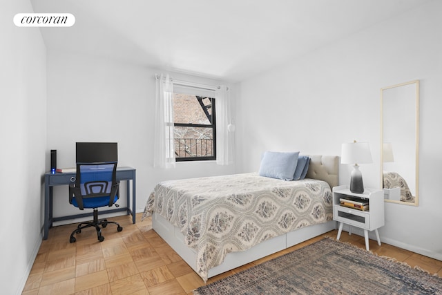 bedroom with visible vents and baseboards