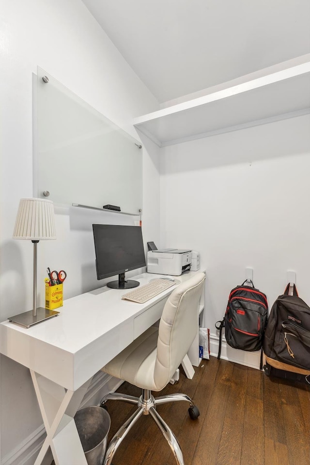 home office with wood-type flooring