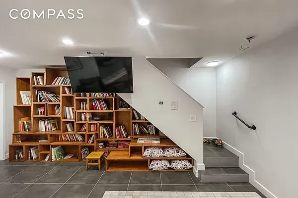 stairs featuring tile patterned flooring and recessed lighting