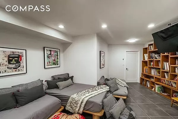bedroom with recessed lighting and dark tile patterned floors