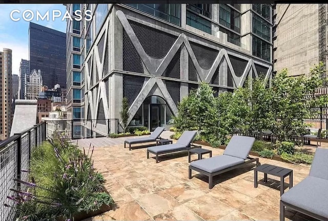 view of patio / terrace featuring a view of city