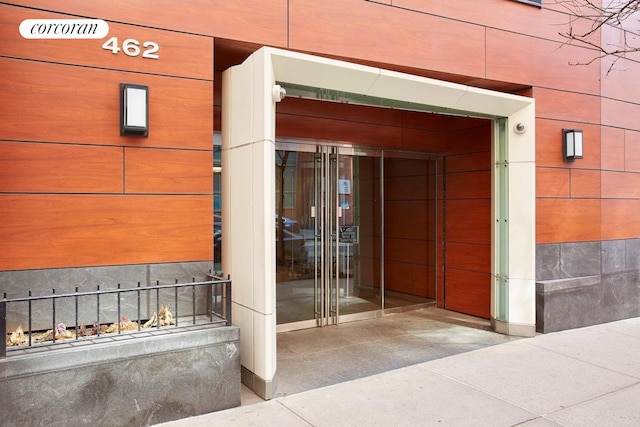 462 W 58th St Unit 1A, New York City, NY 10019 - property entrance featuring fence