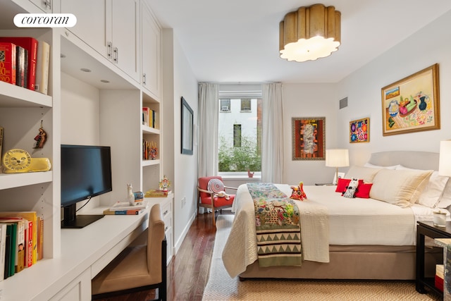 462 W 58th St Unit 1A, New York City, NY 10019 - bedroom with light wood finished floors and an office area