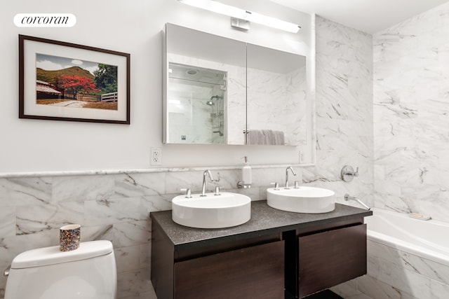 bathroom featuring walk in shower, a bathtub, visible vents, and a sink