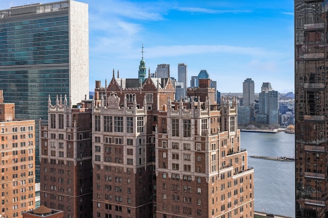 property's view of city featuring a water view