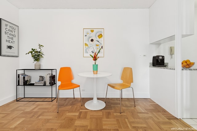 living area with baseboards