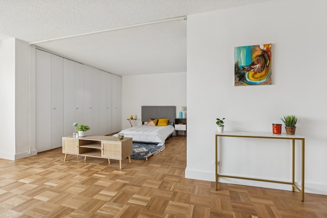 bedroom featuring a textured ceiling