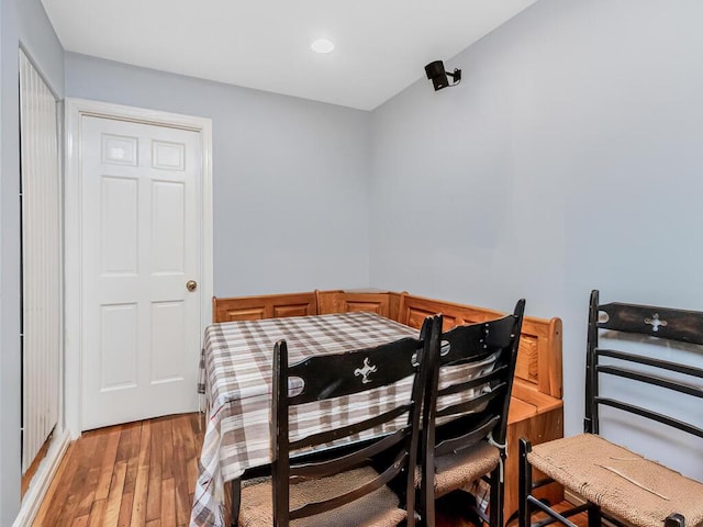 bedroom with recessed lighting and light wood-style floors