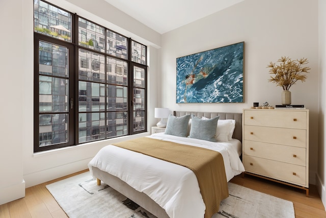 bedroom featuring wood finished floors