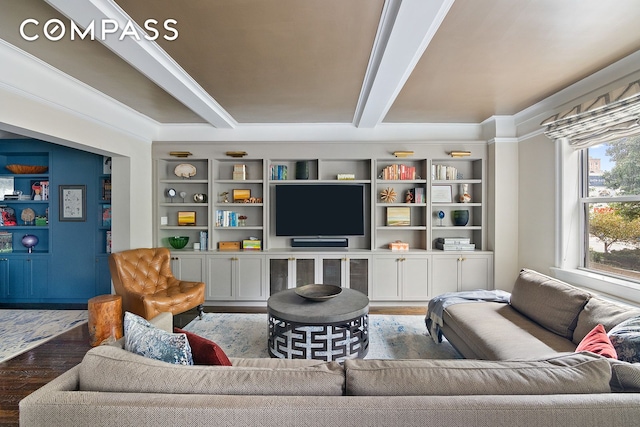 living room featuring beam ceiling and wood finished floors