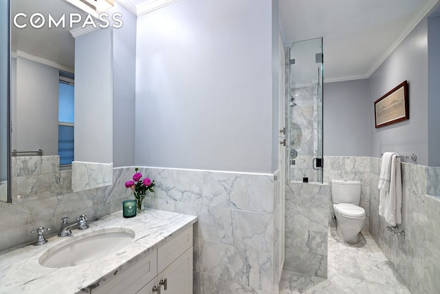 bathroom featuring a shower stall, crown molding, toilet, and tile walls