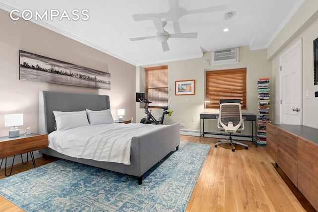 bedroom with ornamental molding, hardwood / wood-style flooring, a baseboard heating unit, a wall unit AC, and baseboards